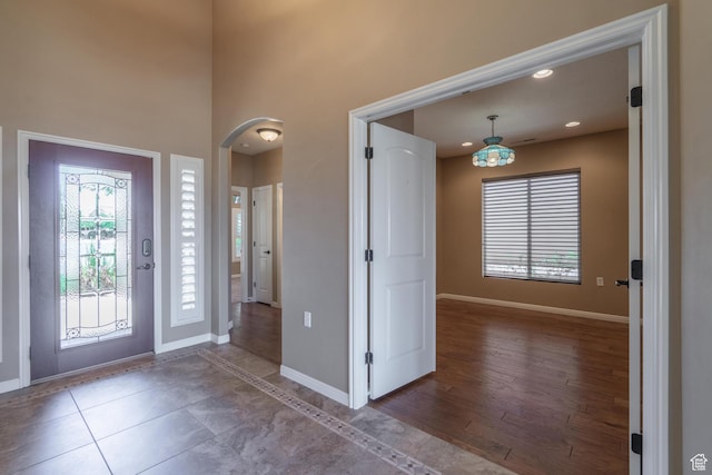 1410 W Ambassador Dr, St George, UT 84790 - foyer featuring arched walkways and a high ceiling