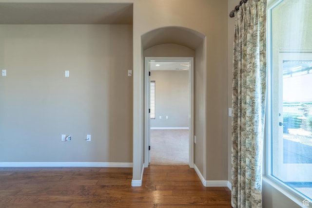 1410 W Ambassador Dr, St George, UT 84790 - foyer with dark wood finished floors, healthy amount of natural light, and arched walkways