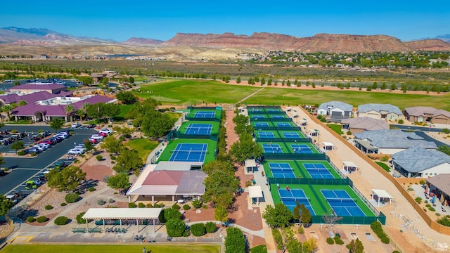 1410 W Ambassador Dr, St George, UT 84790 - aerial perspective of suburban area featuring a mountain backdrop and a golf club