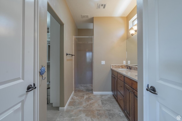 1410 W Ambassador Dr, St George, UT 84790 - bathroom with double vanity and a shower
