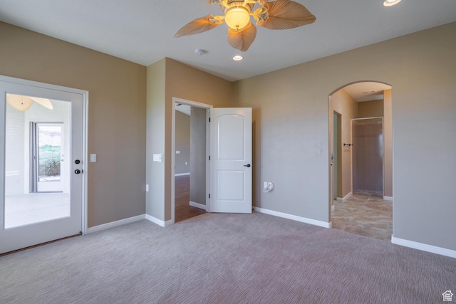 1410 W Ambassador Dr, St George, UT 84790 - unfurnished bedroom featuring arched walkways, carpet flooring, ceiling fan, and recessed lighting
