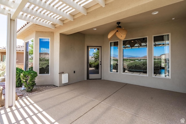 1410 W Ambassador Dr, St George, UT 84790 - view of patio with a ceiling fan and a pergola