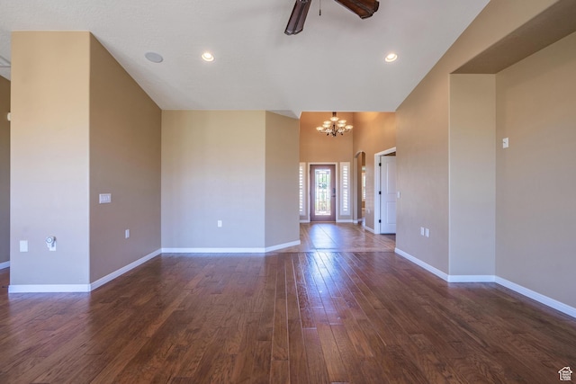 1410 W Ambassador Dr, St George, UT 84790 - unfurnished room featuring a chandelier, dark wood finished floors, ceiling fan, and a high ceiling