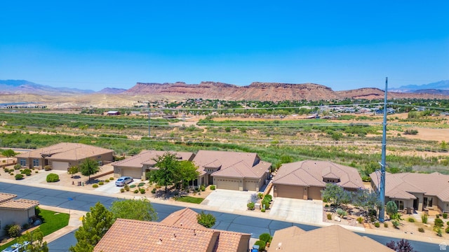 1410 W Ambassador Dr, St George, UT 84790 - aerial perspective of suburban area featuring a mountainous background