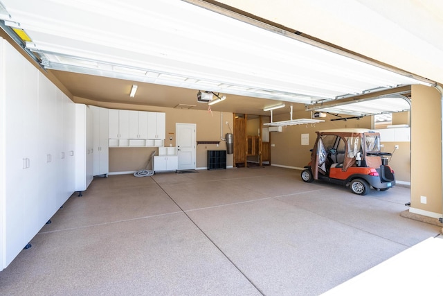 1410 W Ambassador Dr, St George, UT 84790 - garage featuring a garage door opener