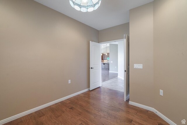1410 W Ambassador Dr, St George, UT 84790 - unfurnished room with wood finished floors and baseboards