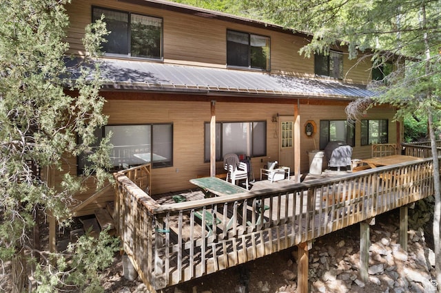 6907 E Mt Aire Rd, Salt Lake City, UT 84109 - back of property featuring a metal roof and a deck
