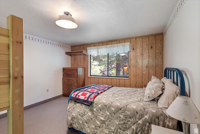 6907 E Mt Aire Rd, Salt Lake City, UT 84109 - carpeted bedroom featuring wood walls and baseboards