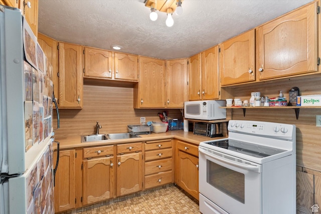6907 E Mt Aire Rd, Salt Lake City, UT 84109 - kitchen featuring white appliances, light countertops, open shelves, and a textured ceiling