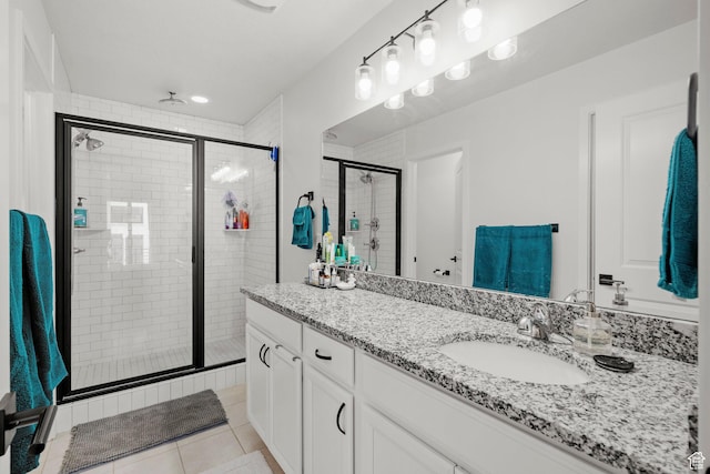 15129 S Halter Way, Bluffdale, UT 84065 - full bathroom with a stall shower, vanity, and tile patterned flooring