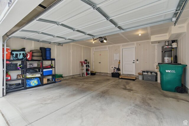 15129 S Halter Way, Bluffdale, UT 84065 - garage with secured water heater and a garage door opener