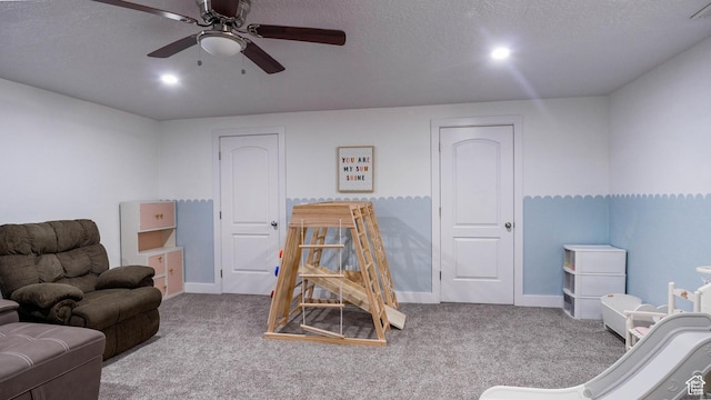 15113 S Bright Stars Dr, Bluffdale, UT 84065 - game room with ceiling fan, carpet, and a textured ceiling