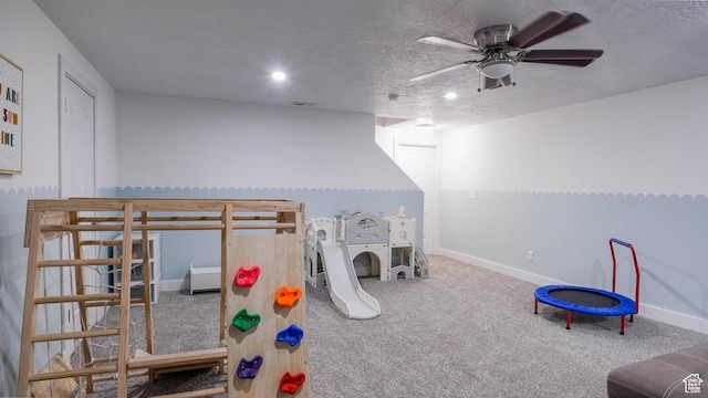 15113 S Bright Stars Dr, Bluffdale, UT 84065 - recreation room featuring carpet flooring, a ceiling fan, a textured ceiling, and recessed lighting