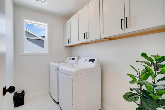 856 S 250 W, American Fork, UT 84003 - laundry room featuring washing machine and clothes dryer, cabinet space, and light marble finish floors