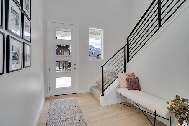 856 S 250 W, American Fork, UT 84003 - entryway featuring stairway, light wood-style flooring, and a high ceiling