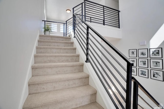 856 S 250 W, American Fork, UT 84003 - staircase featuring a high ceiling and baseboards