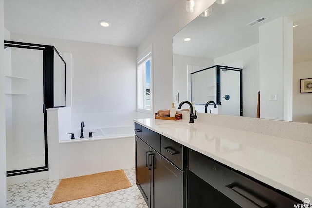 856 S 250 W, American Fork, UT 84003 - bathroom featuring vanity, a shower stall, tile patterned floors, a garden tub, and recessed lighting
