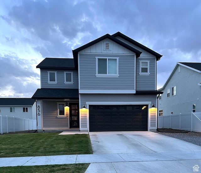 856 S 250 W, American Fork, UT 84003 - view of front facade with driveway, board and batten siding, and a garage