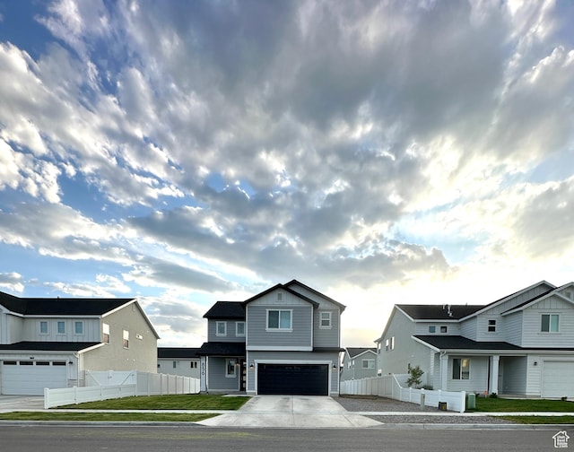 856 S 250 W, American Fork, UT 84003 - view of front of home with an attached garage, driveway, and a residential view