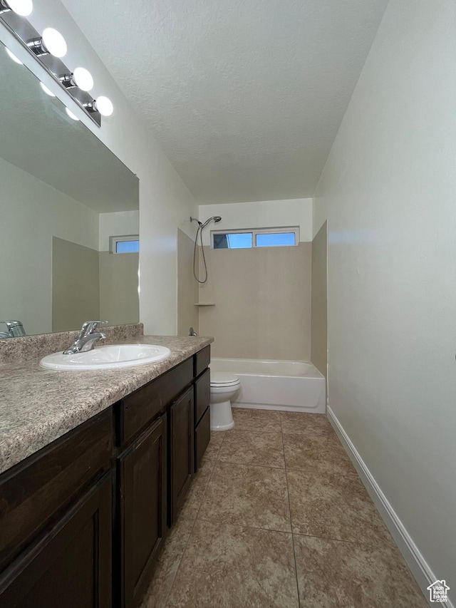 5558 W Dornton Ct, Herriman, UT 84096 - bathroom featuring vanity, washtub / shower combination, and tile patterned floors