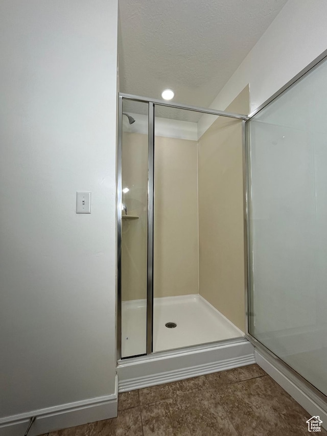 5558 W Dornton Ct, Herriman, UT 84096 - full bath featuring a stall shower and a textured ceiling
