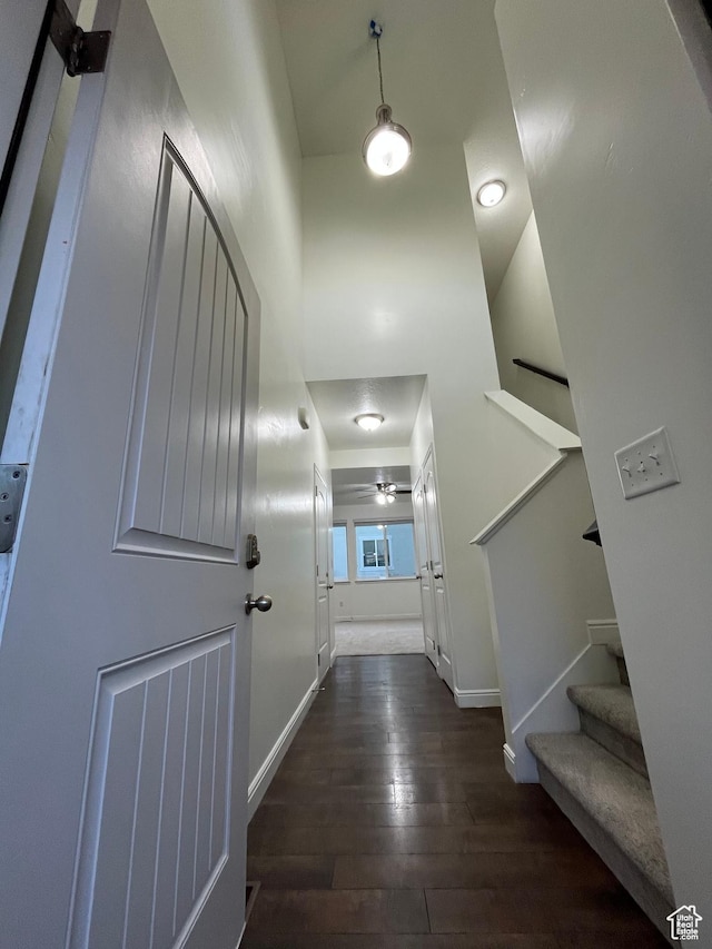 5558 W Dornton Ct, Herriman, UT 84096 - corridor with dark wood-style floors and stairs