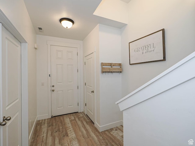 1051 W Narrows Ln S, Bluffdale, UT 84065 - foyer entrance with light wood-style floors and baseboards