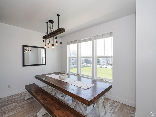 1051 W Narrows Ln S, Bluffdale, UT 84065 - dining space featuring baseboards and light wood-style flooring