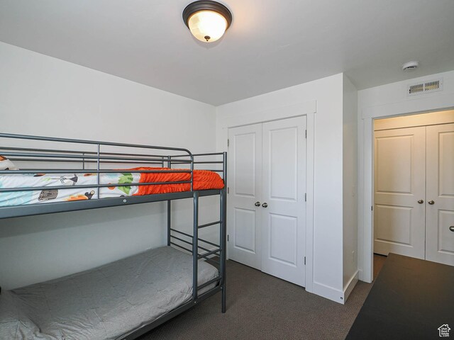 1051 W Narrows Ln S, Bluffdale, UT 84065 - bedroom featuring dark colored carpet and a closet