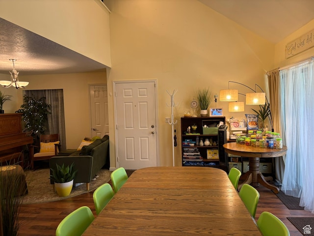 8158 S Cottonwood Hills Cir, Sandy, UT 84094 - dining area featuring wood finished floors, a chandelier, and a high ceiling