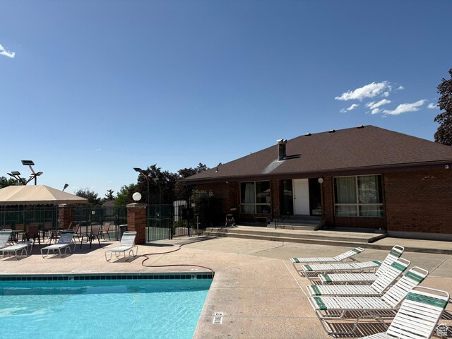 8158 S Cottonwood Hills Cir, Sandy, UT 84094 - community pool with a patio