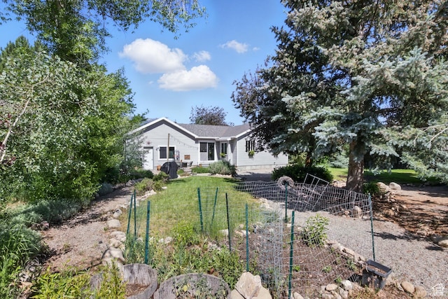 2265 Casperville Rd, Heber City, UT 84032 - view of front of home with a vegetable garden and a front yard