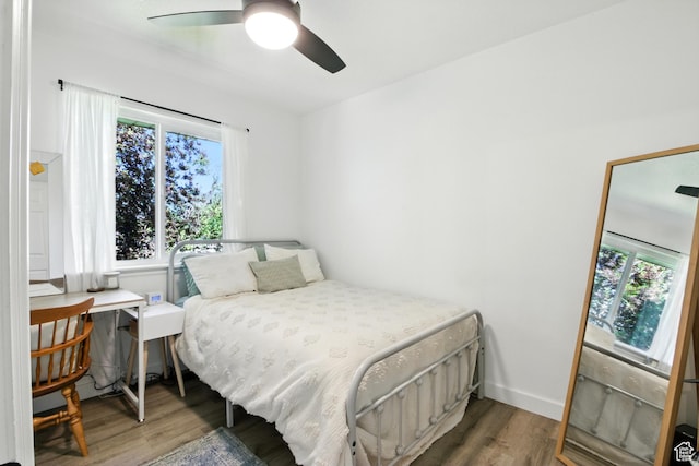 2265 Casperville Rd, Heber City, UT 84032 - bedroom featuring wood finished floors, multiple windows, and ceiling fan