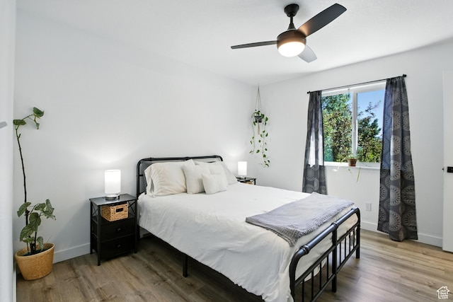 2265 Casperville Rd, Heber City, UT 84032 - bedroom with light wood-style floors and ceiling fan