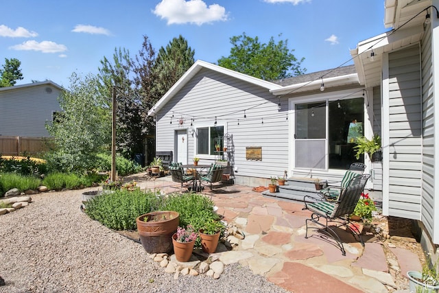 2265 Casperville Rd, Heber City, UT 84032 - rear view of property with a patio, a shingled roof, and entry steps