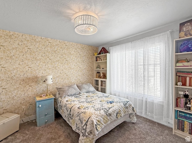 4491 Haven Rd Unit 11E, West Haven, UT 84401 - carpeted bedroom featuring multiple windows and a chandelier