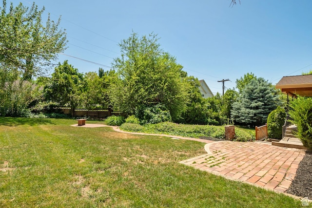 2922 E Hillsden Dr, Holladay, UT 84117 - view of green lawn featuring a patio