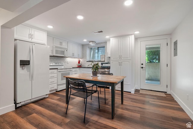 2922 E Hillsden Dr, Holladay, UT 84117 - kitchen featuring white appliances, backsplash, white cabinetry, dark wood-style floors, and recessed lighting