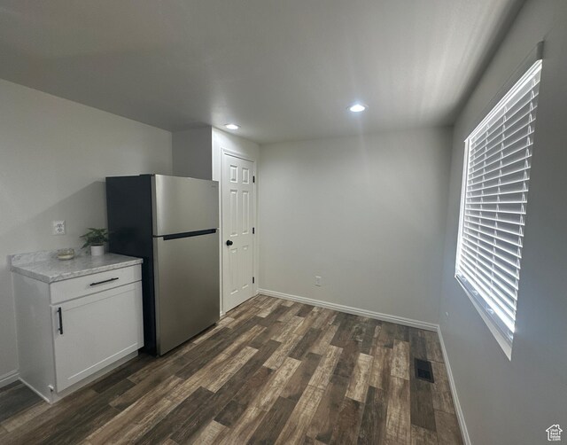 469 Canfield Dr, Ogden, UT 84404 - kitchen featuring freestanding refrigerator, dark wood-type flooring, recessed lighting, light countertops, and white cabinetry