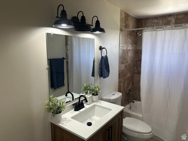 469 Canfield Dr, Ogden, UT 84404 - bathroom with vanity and shower / bathtub combination with curtain