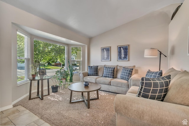 6925 S Sparrowtail Rd W, West Jordan, UT 84081 - living room featuring vaulted ceiling and baseboards
