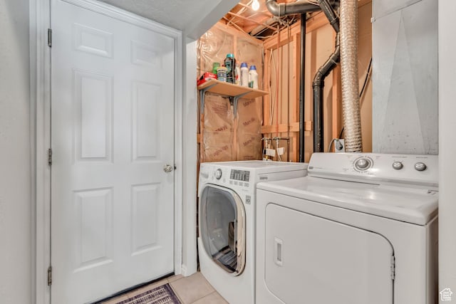 6925 S Sparrowtail Rd W, West Jordan, UT 84081 - laundry room with separate washer and dryer and light tile patterned floors