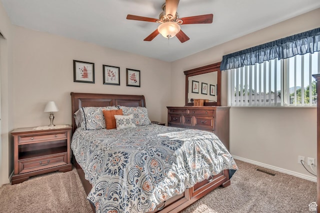 6925 S Sparrowtail Rd W, West Jordan, UT 84081 - carpeted bedroom with baseboards and a ceiling fan