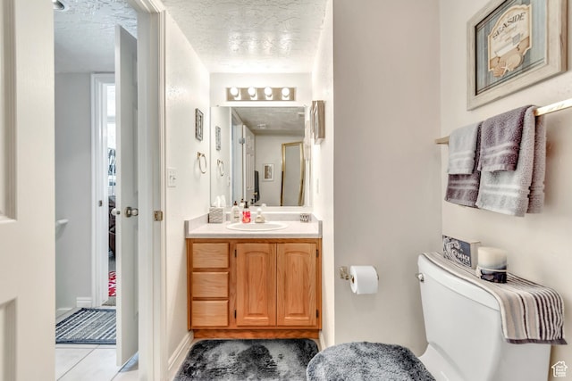 6925 S Sparrowtail Rd W, West Jordan, UT 84081 - half bathroom with vanity, a textured ceiling, and tile patterned flooring
