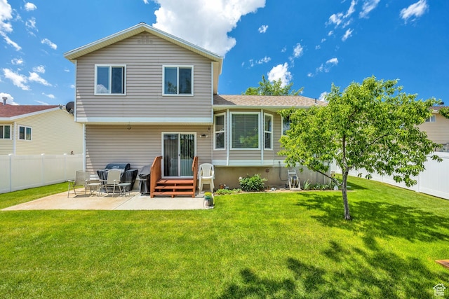 6925 S Sparrowtail Rd W, West Jordan, UT 84081 - back of house featuring a patio