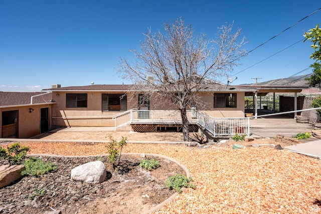42 S Juniper Dr, Cedar City, UT 84720 - back of house with stucco siding