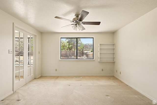 42 S Juniper Dr, Cedar City, UT 84720 - empty room with carpet floors, ceiling fan, and a textured ceiling