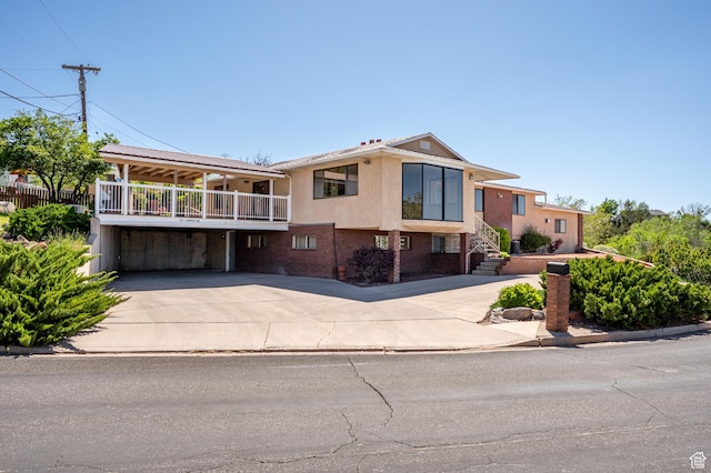 42 S Juniper Dr, Cedar City, UT 84720 - view of front of property featuring driveway and brick siding