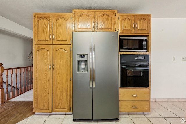 42 S Juniper Dr, Cedar City, UT 84720 - kitchen featuring stainless steel appliances and light tile patterned floors