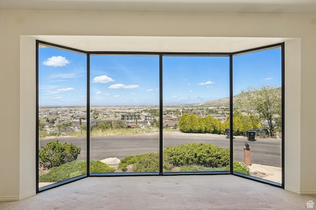 42 S Juniper Dr, Cedar City, UT 84720 - carpeted empty room with healthy amount of natural light and a mountain view